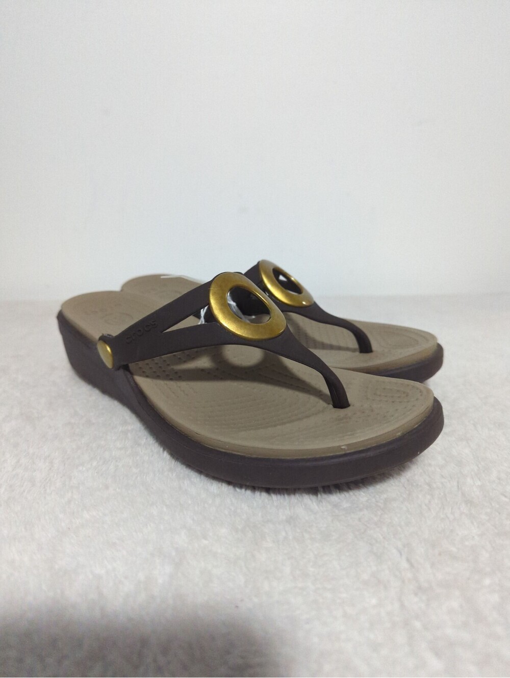 Crocs Women's Brown Thong Sandals with Gold Accent Size 7